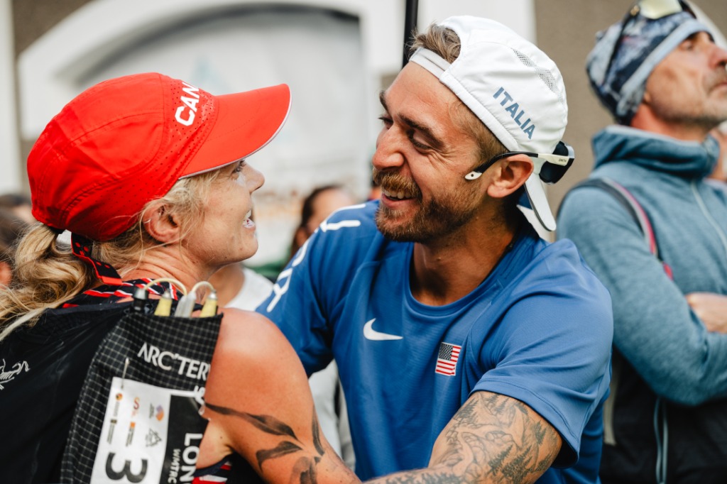 Michelino smiling with Jazmine Lowther at her World Championships finish line