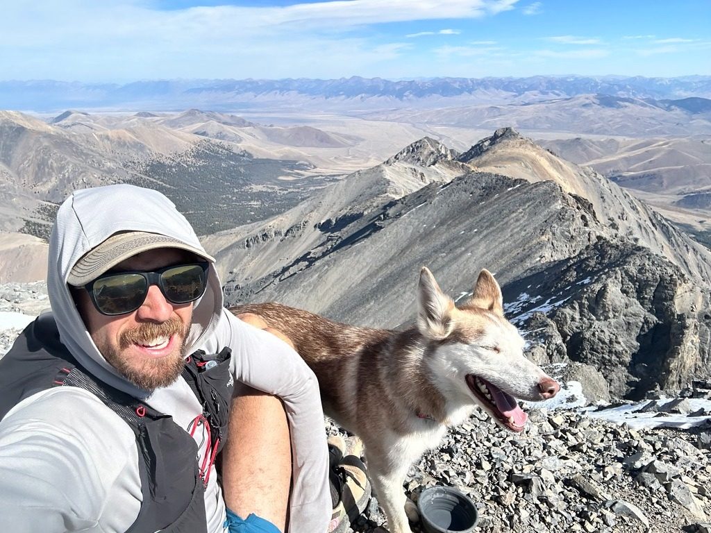 Michelino and his husky Thor on a summit